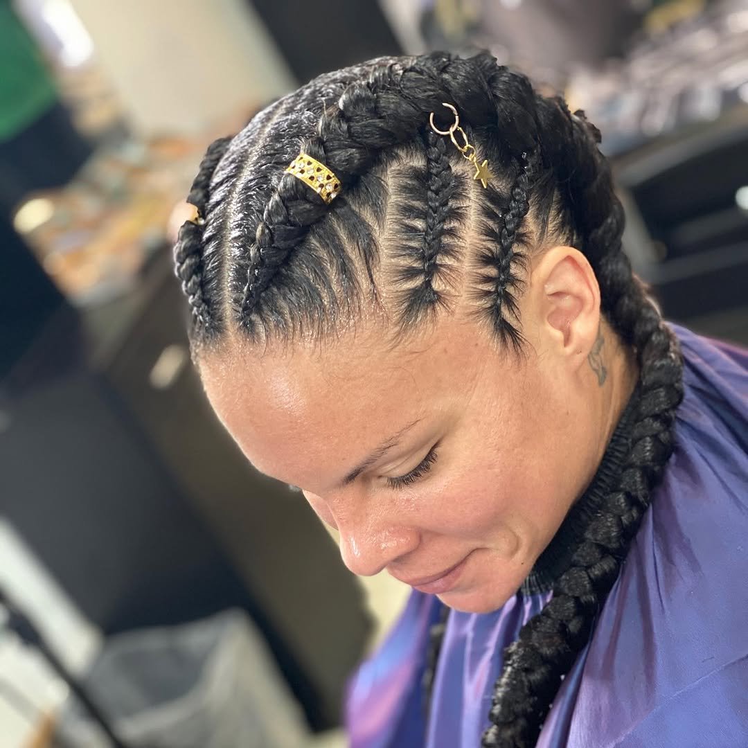 Feed-in braids with gold hair cuffs, braided at Major Cuts in Lewiston