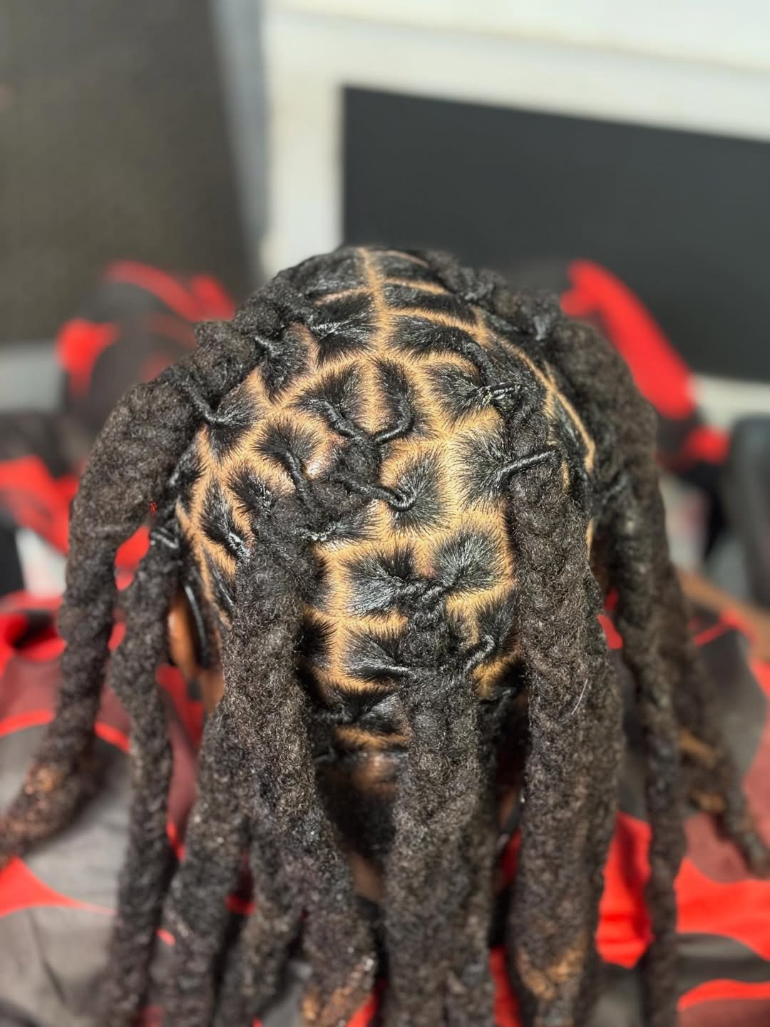Loc retwist with clean parts